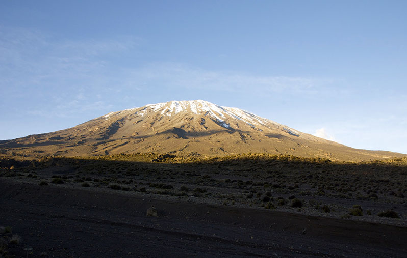 Mount Kilimanjaro's summit is seen at dawn from the slopes below. (Alan Boswell/MCT)