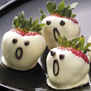The next Halloween recipe are these easy, no-bake "Strawberry Ghosts". All that is needed are chocolate chips, strawberries, almond extract, and white baking chocolate. Just melt the white chocolate and then dip the strawberries in them. Let them cool for a few hours, then make your own fun design on them with the chocolate chips!