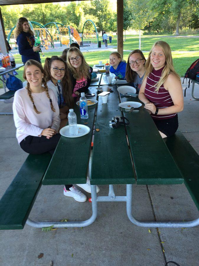 Several members of International Club got together in the fall to have a picnic and get to know each other.