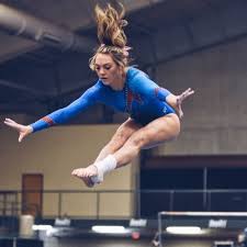 Mohr competes her beam routine that will hopefully lead her to qualify for state gymnastics.