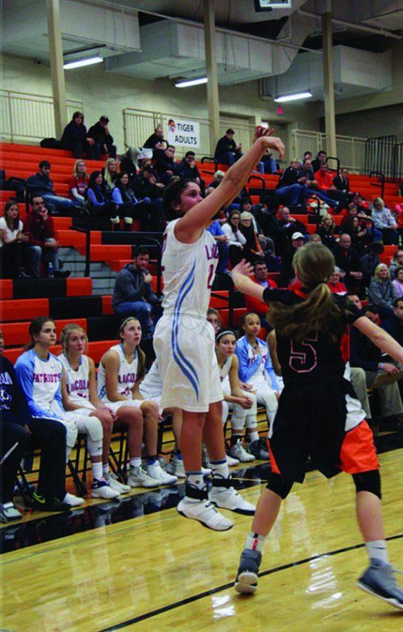 Sydney Rosinsky shoots a jump shot during a game.