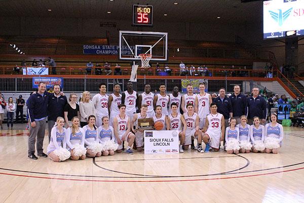 The LHS boys basketball team took home third place in the 2017 state basketball tournament.  Gatluak is pictured in the back row seventh from the left and Higgason is pictured in the front row tenth to the left.