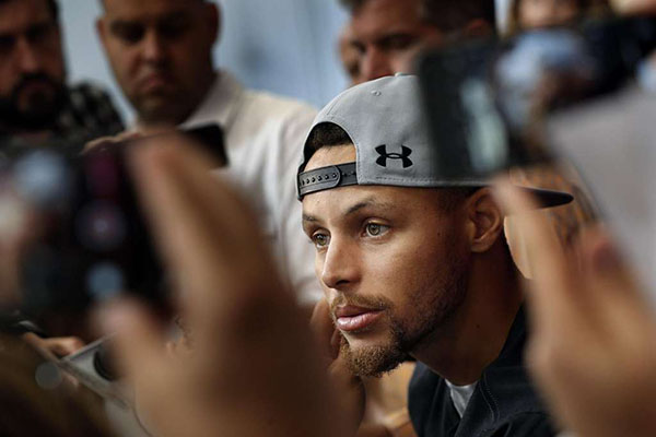 Stephen Curry answers questions from the media after being uninvited to the White House by President Trump.