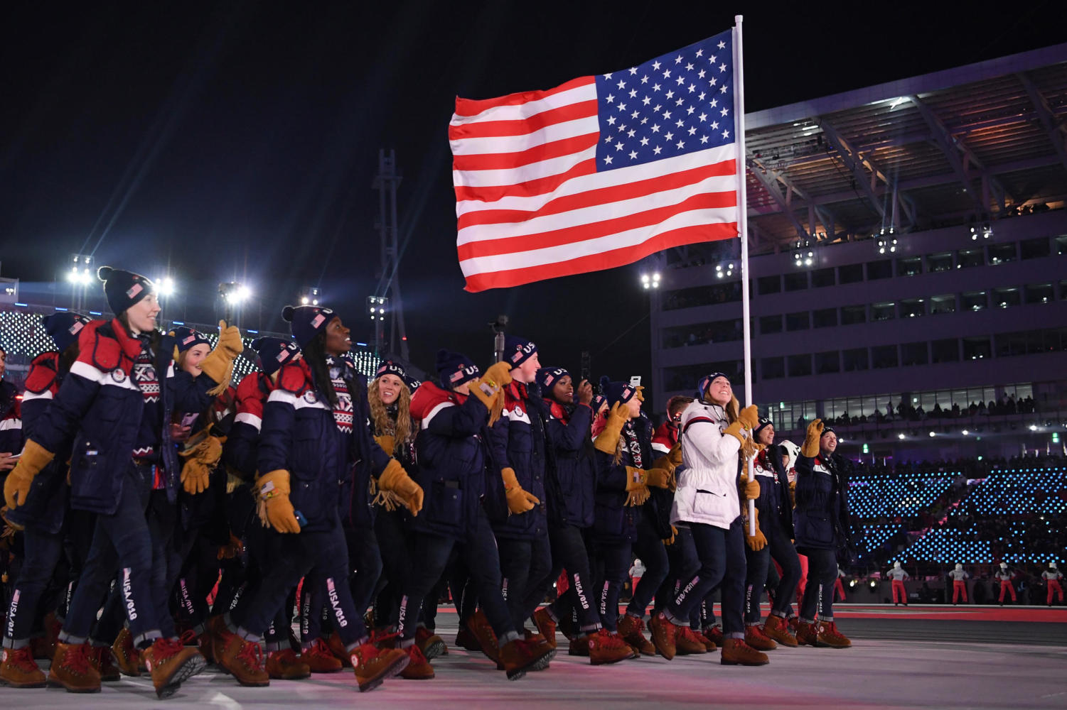 The U.S. Olympic team walks in the Parade of Athletes before the 2018 Pyeongchang Winter Olympics.