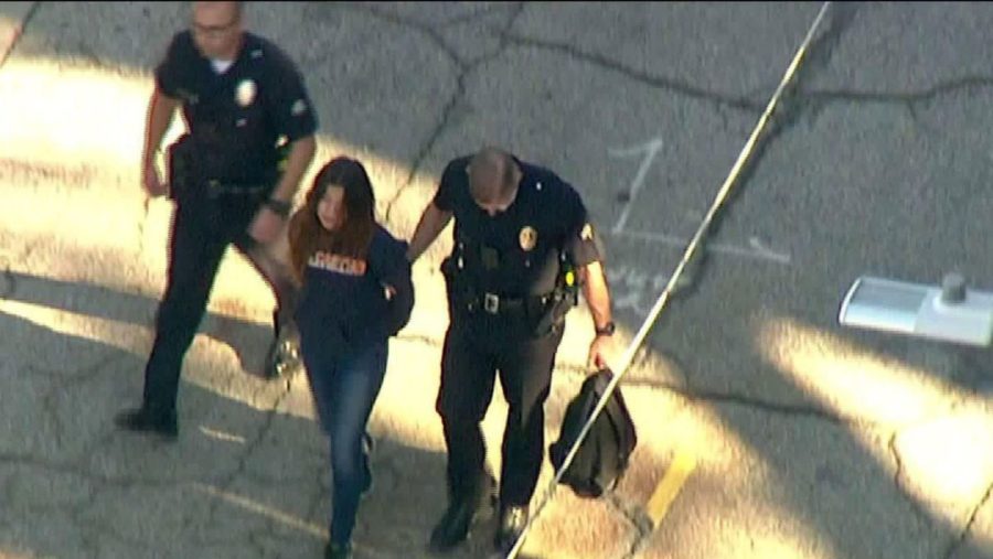 Student being placed into custody following morning shooting at middle school.