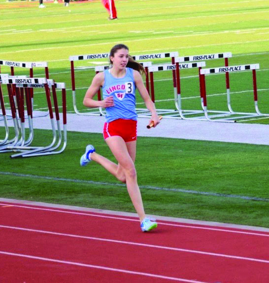 Morgan Hansen running for LHS during a relay