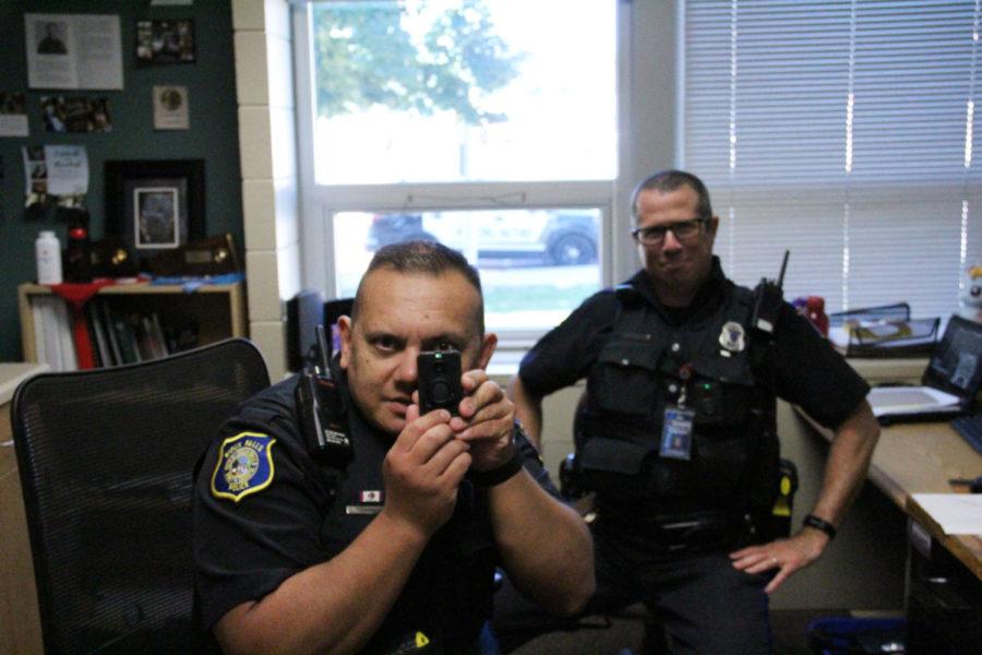 Demonstrating the body cams.  