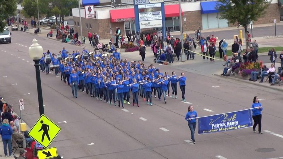 The PHMS Marching Band performing at the Festival of Bands parade in downtown Sioux Falls, South Dakota. 