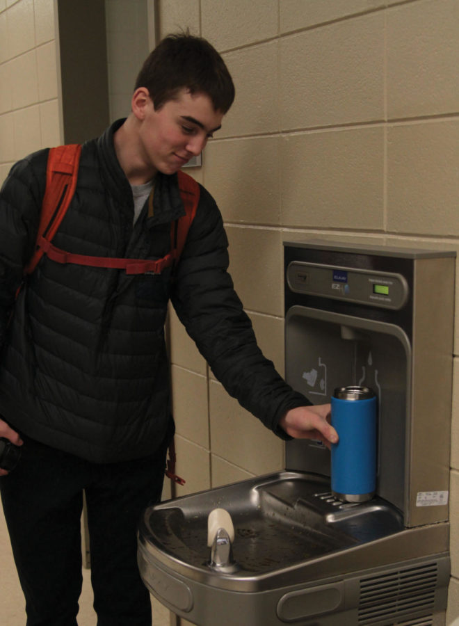 LHS freshman Charlie Mickelson takes a gamble and drinks the regular E-Wing water. 
