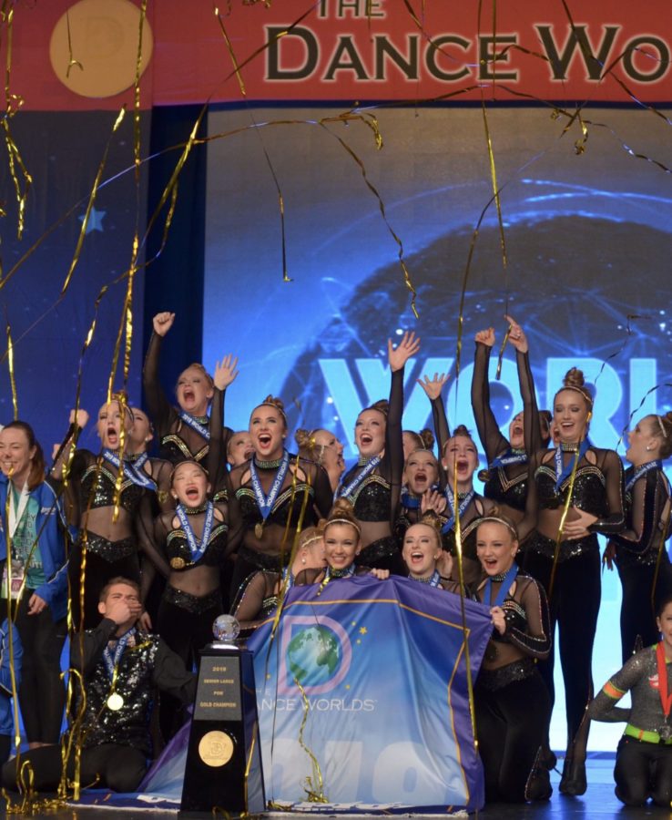 Champion Legacy after placing first in their pom routine at Worlds.