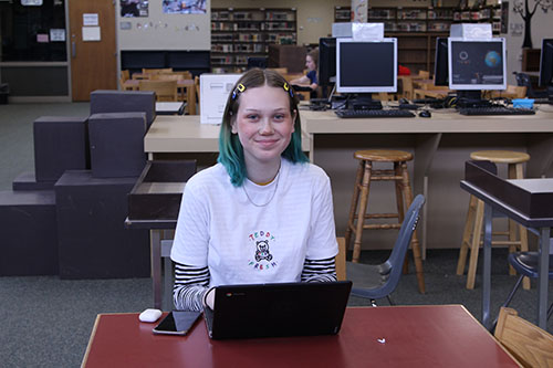 Isabella Szabo smiles for a picture after writing a nice appreciation note for a teacher she looks up to. 