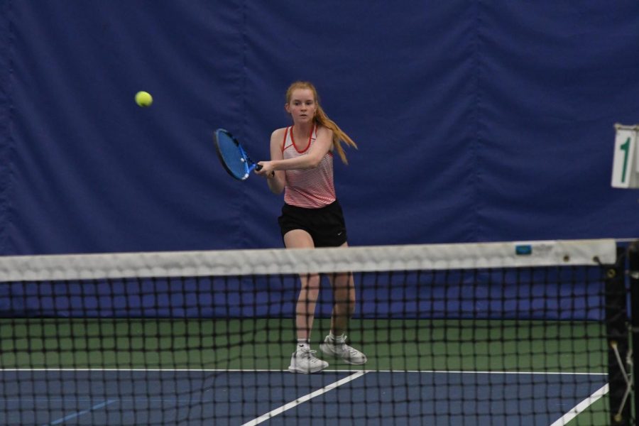 Junior Avery Blackman hits a backhand at the SDHSAA AA girls State tennis tournament.