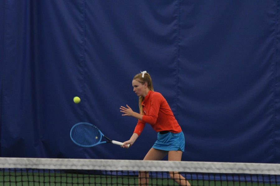Senior Brita Quello hits a volley at the SDHSAA AA girls State tennis tournament.