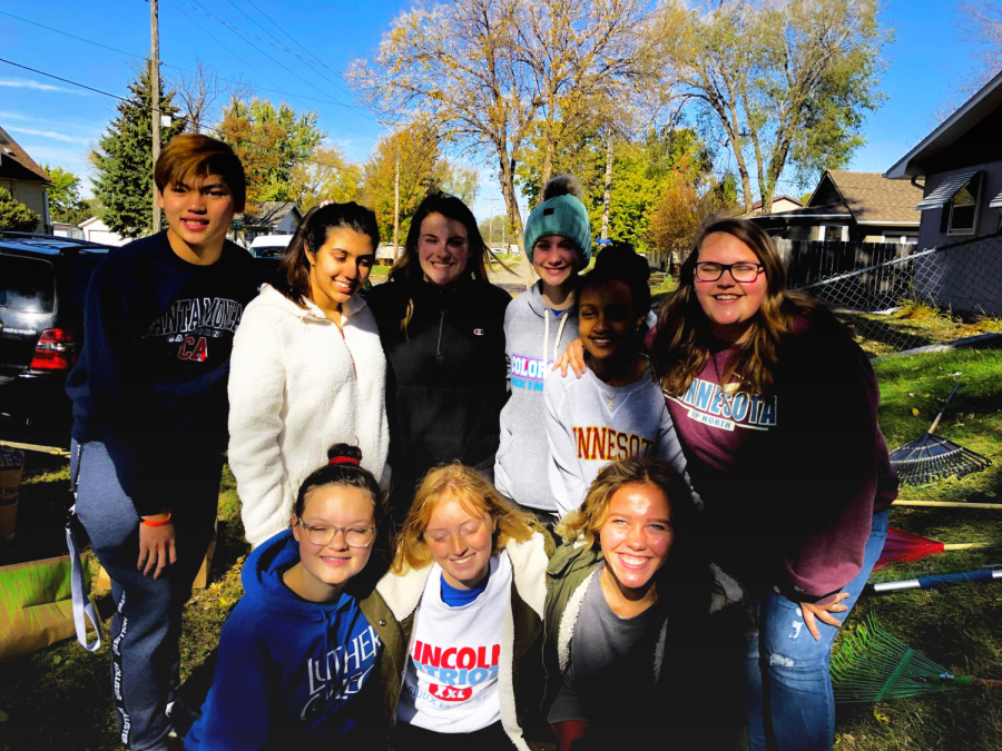 The DECA kids who volunteered for Rake the Town pose for a photo. Top, left to right: Kim Ueng, Areej Nazir, Abbie DeKramer, Hallie Luther, Haroni Sahilu, Genna Sheriff. Bottom, left to right: Mary Steffen, Kat Steffen and Avery Dooley.