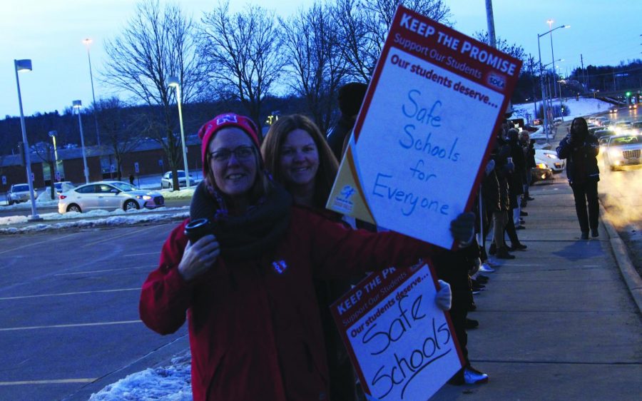 LHS teachers Kristi Oskar-Groen and Tanya Bjerke participating in the LHS walk-in.