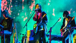 Tame Impala’s lead vocalist, Kevin Parker, performing at the ACL Music Festival.