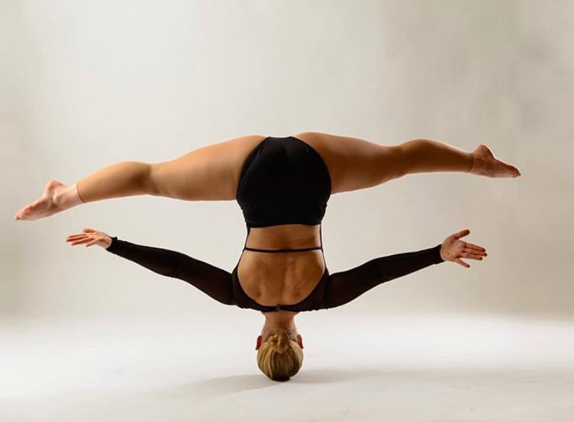 In this picture Lange showcases her signature move, spinning on her head while in the splits.  