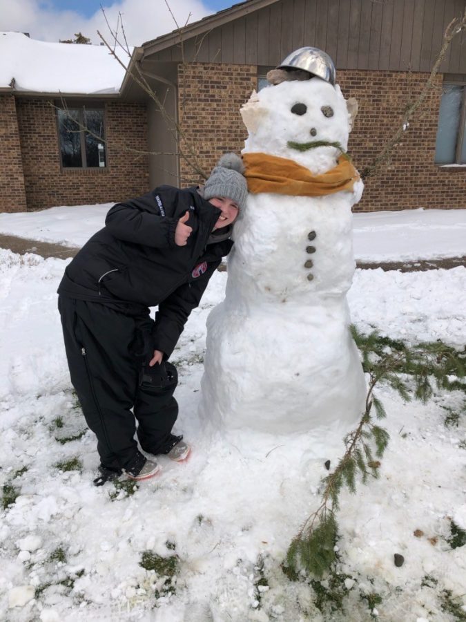 LHS Junior Chloe Harbaugh and her snowman named Garrold the General.