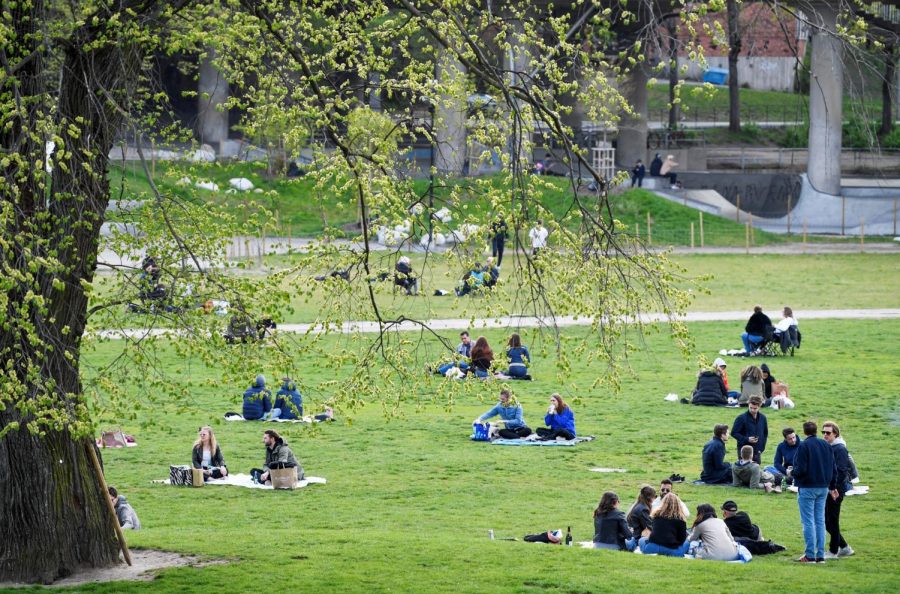 People gathered together on a beautiful spring day at the Ralambshov park during the COVID-19 pandemic in Stockholm, Sweden on May 8, 2020.