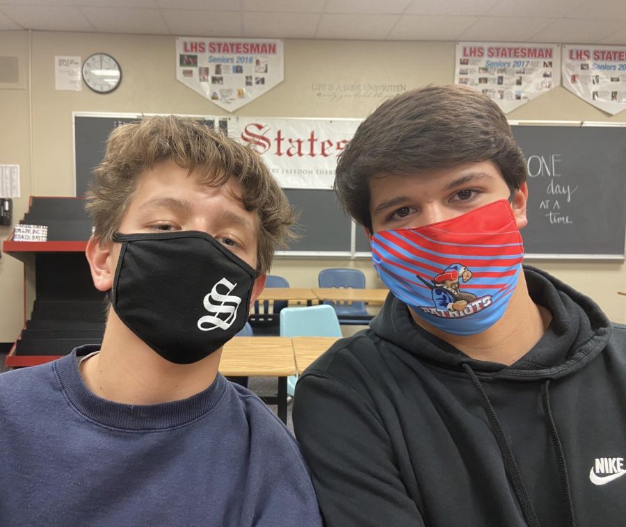 Statesman+staff+writers+Caleb+Hiatt+and+Carter+Ericson+show+off+their+masks.