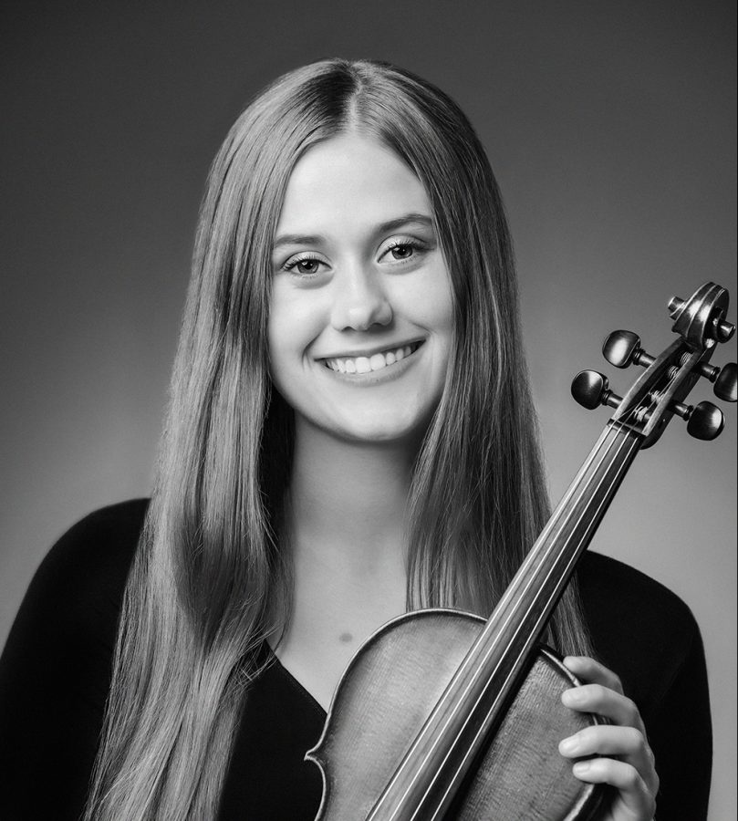 Elizabeth+Jerstad+poses+with+her+violin%2C+which+she+plans+to+continue+playing+at+Stanford+next+year.