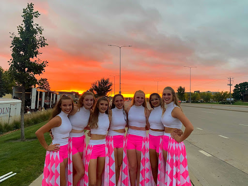 LHS color guard girls pose at Howard Wood Field ready for the Festival of the Bands competition this past Saturday.