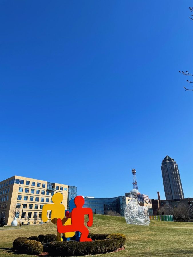 The Pappajohn Sculpture Park in Downtown Des Moines displays sculptures by more than two dozen world-renowned artists, including “Untitled (Three Dancing Figures, Version C)” by Keith Haring. 