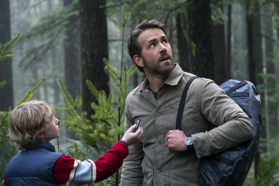 Walker Scobell and Ryan Reynolds interact as different versions of Adam Reed
