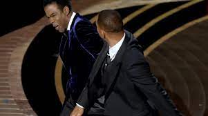 Will Smith slapping Chris Rock across the face at the Oscars