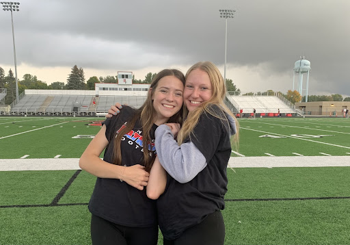 On the sidelines of the Brandon Valley football game this past fall with fellow manager, Maddy Bauman.