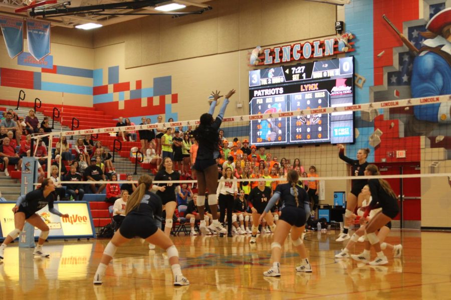Jazmen Kutey, #19, going up for a block against the Lynx.