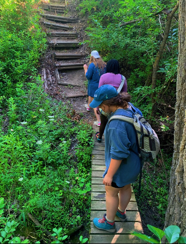 Emma Forster and I hiking after a long night of camping and somehow Forster had convinced me to go camping twice this summer. 