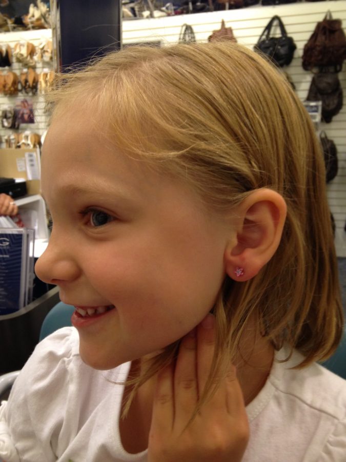 A big moment for me when I was young was getting my ears pierced. It made me feel older and special because I was just like my older sister who I looked up to.  