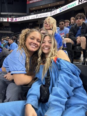 Dilynn and I in all blue watching the LHS boys basketball team compete in the state tournament in Rapid City.