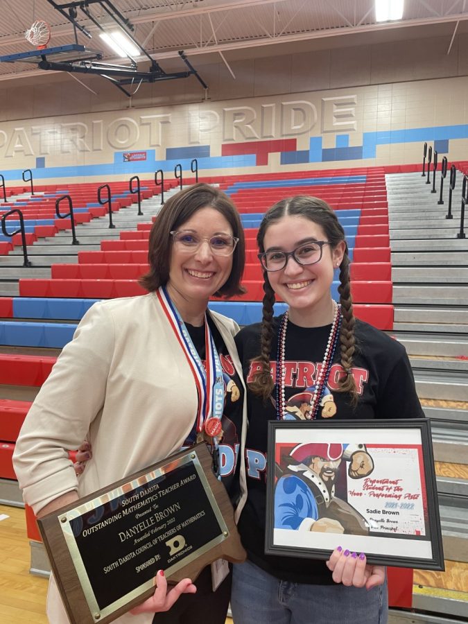 Danyelle+Brown+and+her+daughter+Sadie+with+their+awards+after+the+2022+Patriot+Pride+assembly.