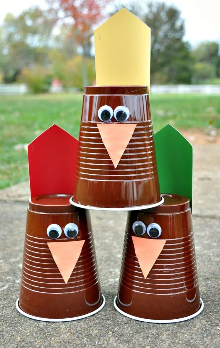 Three turkey bowling pins are set up by using brown plastic cups and turkey decorations. Photo used with permission by Blair Lonergan.