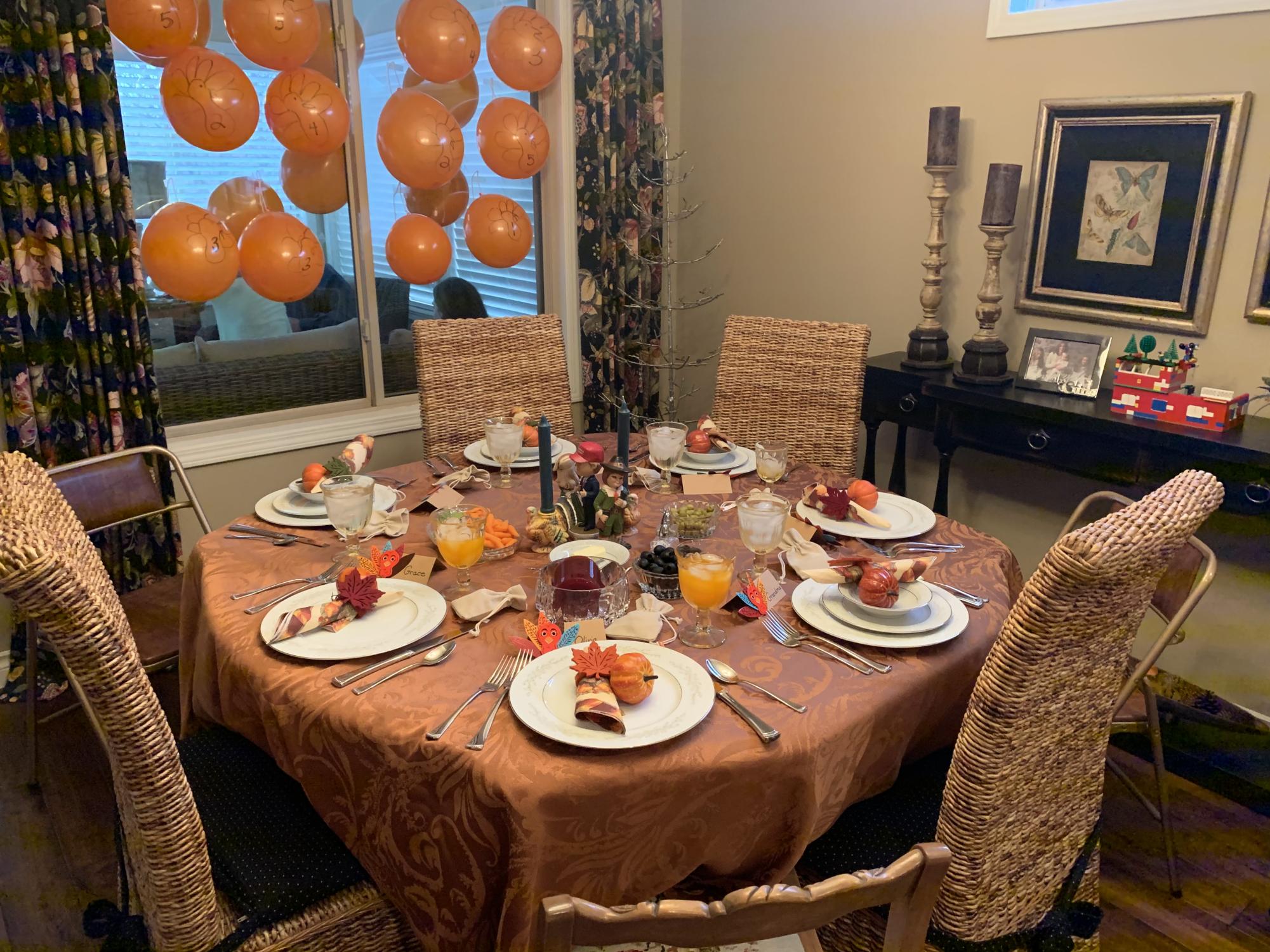 The elaborate setup for the anticipated turkey shoot, with orange balloons representing turkeys. Photo used with permission by Nichole Miner. 