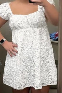 One of the two dresses I tried on at Scheels in Sioux Falls. I wanted to see what the texture looked like compared to the more plain dress. Also, if the sleeves would have any… impact on how it would look under the gown…they did not.