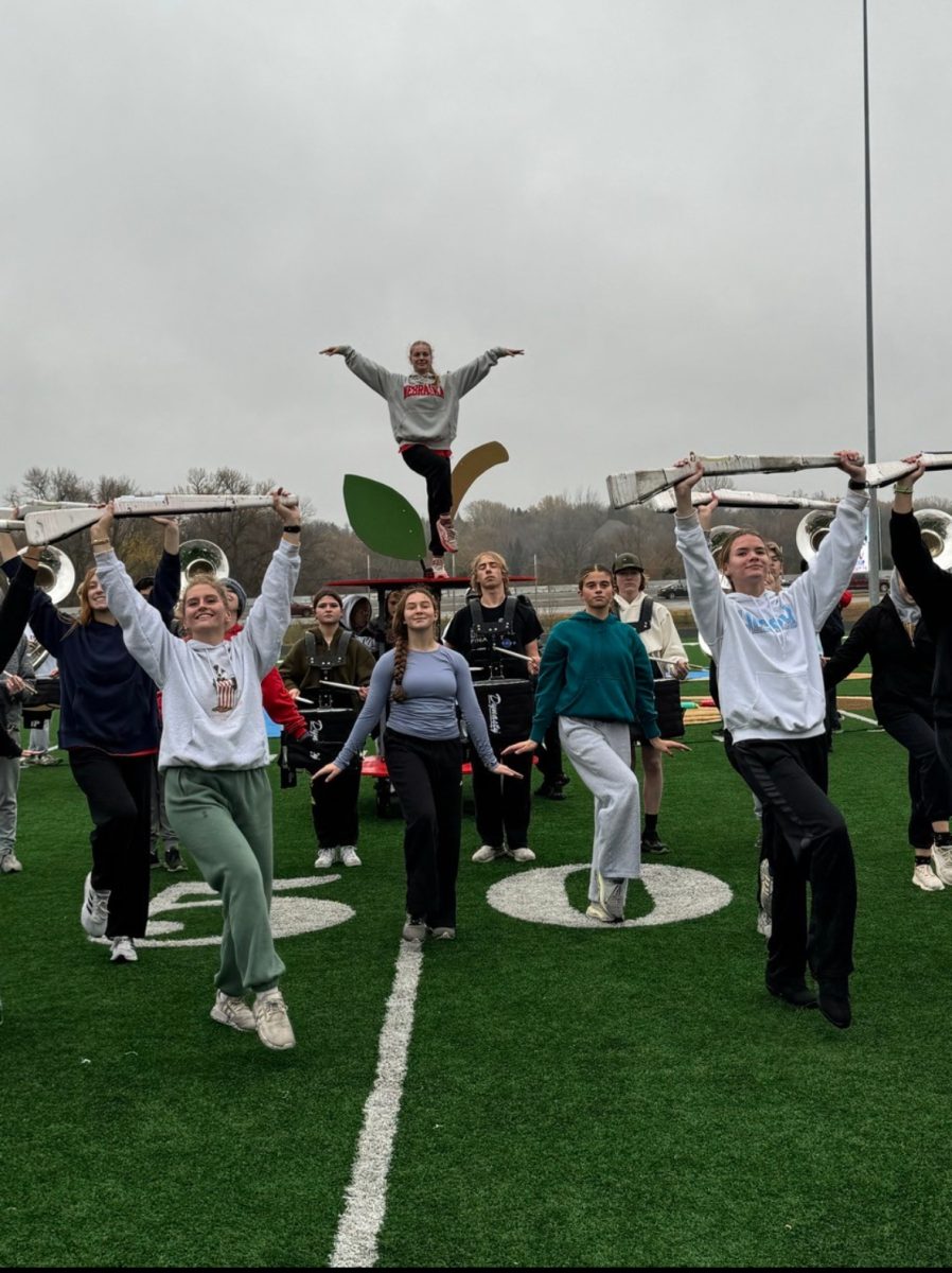 LHS marching band practices their routine, including the color guard (Photos used with permission by  Seirra Pattin)