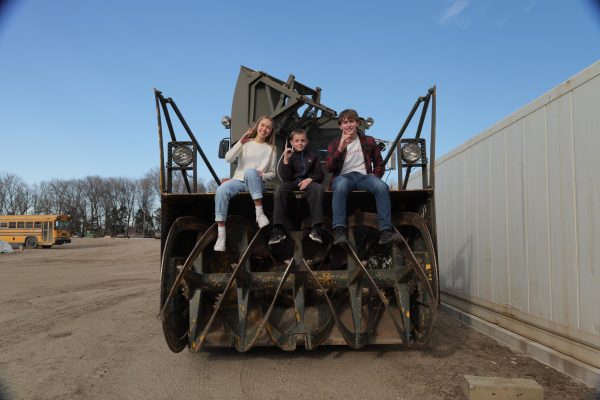  Naomi Jespersen, Joseph Tunge and a Hutterite student show their “Lincoln Crazies" pride.