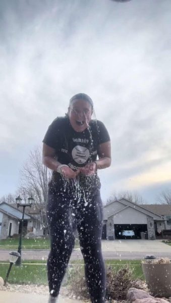 LHS senior, Ella Rima, participates in the Ice Bucket Challenge to spread awareness for mental health. (Photo provided by Ella Rima)