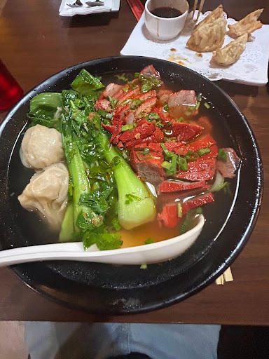 Wonton Noodle Soup contains pork bone broth served with ground pork wonton, bok choy and BBQ pork.