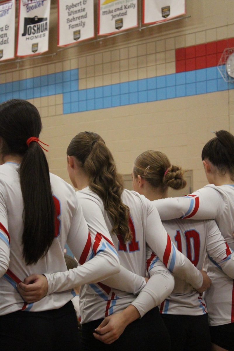 Team huddle getting ready to play for a chance to go to the 2025 state volleyball tournament. 