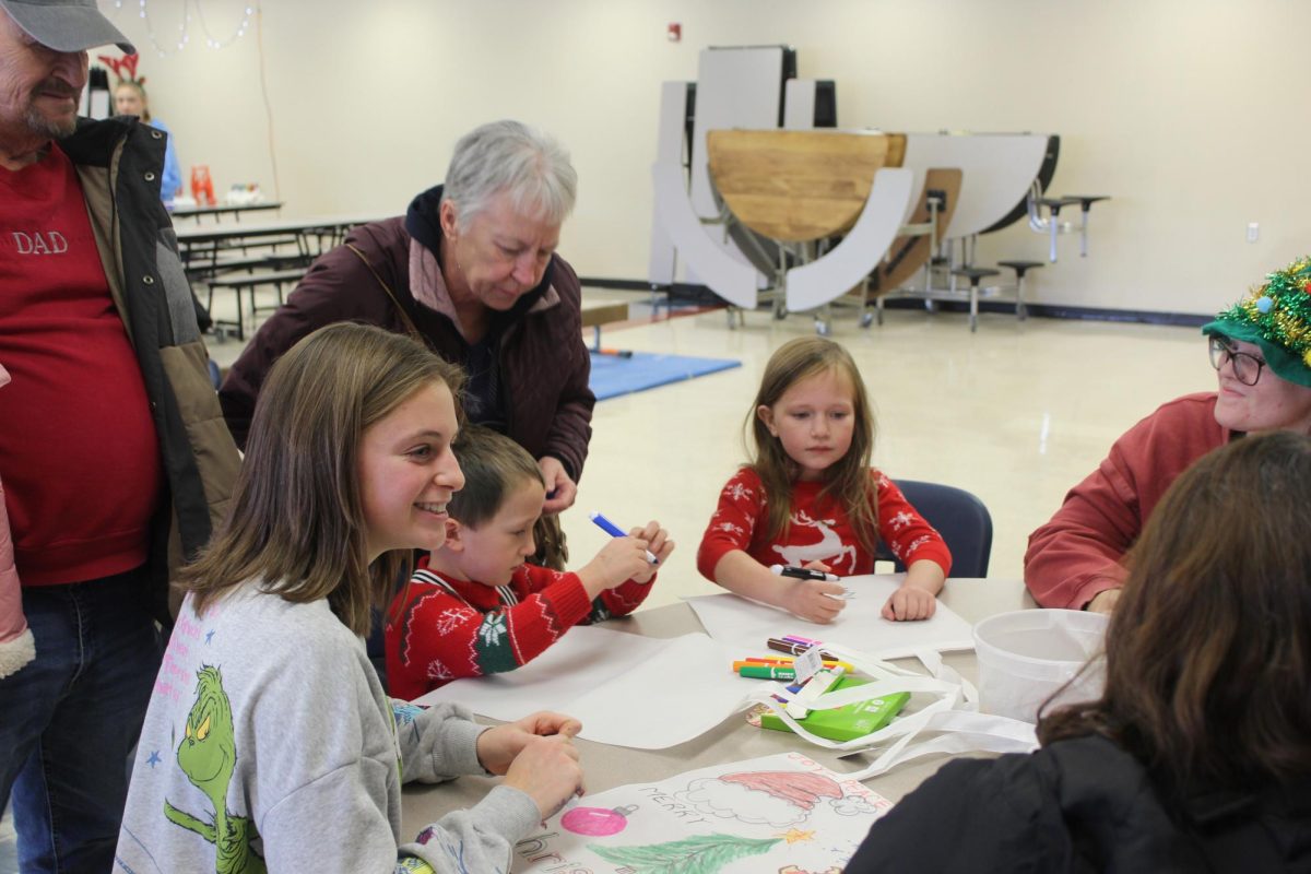 Dressed for the holidays, children were able to decorate their tote bags before collecting candy, crafts and more.