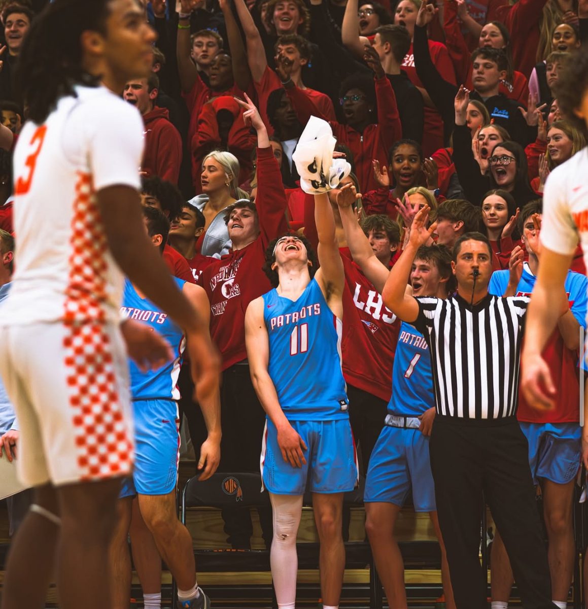A picture of an LHS basketball game at WHS when they played the Warriors. 
