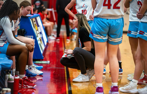 Morgan Hansen inspires and motivates her team in a close game against RCCHS (Photo used with permission by Kami Wessels).