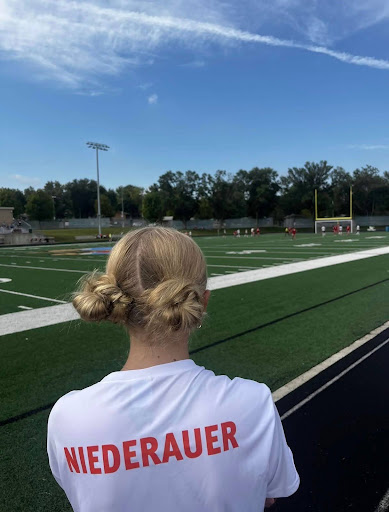 Ainsley Niederauer on the sidelines during an LHS varsity soccer game (Photo used with permission by Ainsley Niederauer).