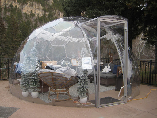 A heated igloo is placed behind Latchstring Restaurant for customers to use to stay warm while enjoying a beautiful view.
