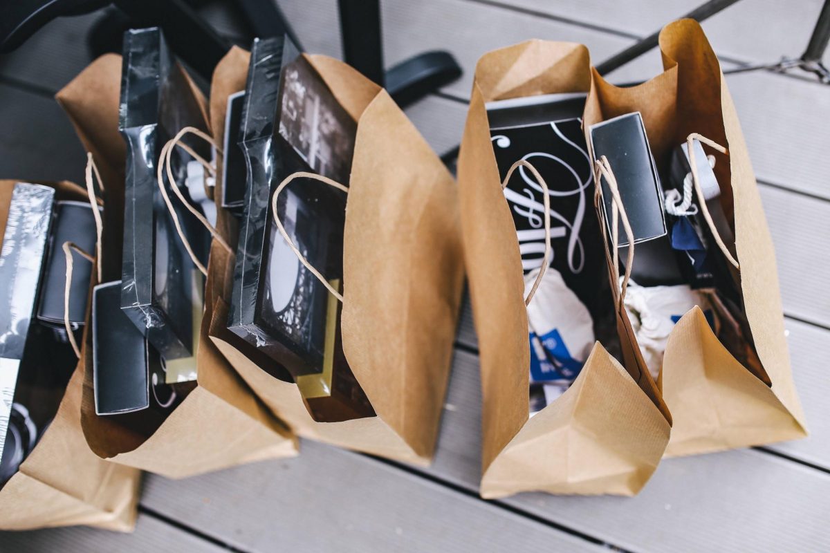 Many feel inclined to purchase bags of clothes, care items, and other goods when they shop at in-person stores, but the most frequent overconsumption is done online (Photo used with permission by PickPik).
