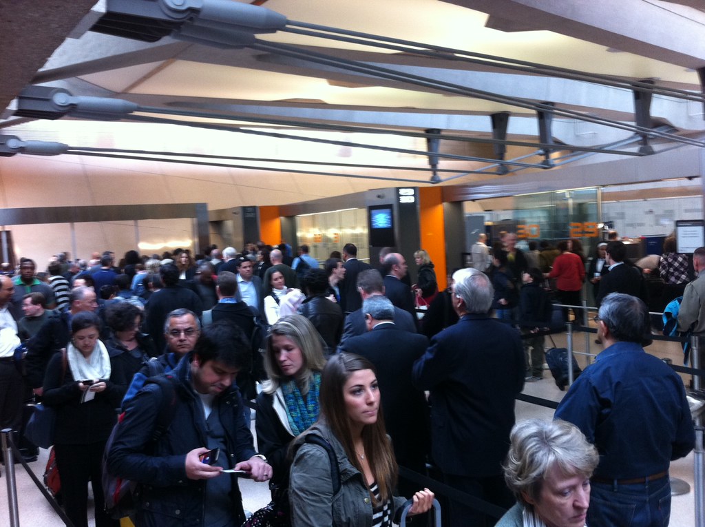 During the shutdown, TSA lines have seen waits of up to six hours, with some airports' lines extending into the street (Photo used with permission by Flickr/Steve Buttry).